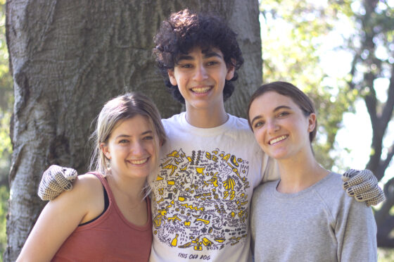 Three students posing for camera