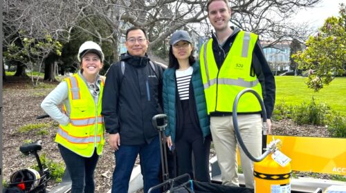 Four people with equipment